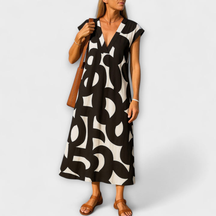 Tirzah - Elegant V-Neck Dress with Geometric Print
