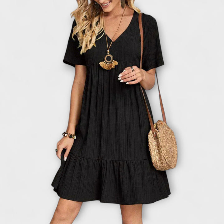 Audrey - Chic Bohemian Ruffle Hem Mini Dress