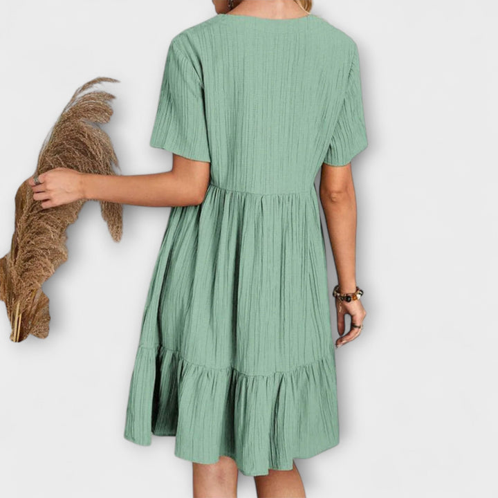 Audrey - Chic Bohemian Ruffle Hem Mini Dress