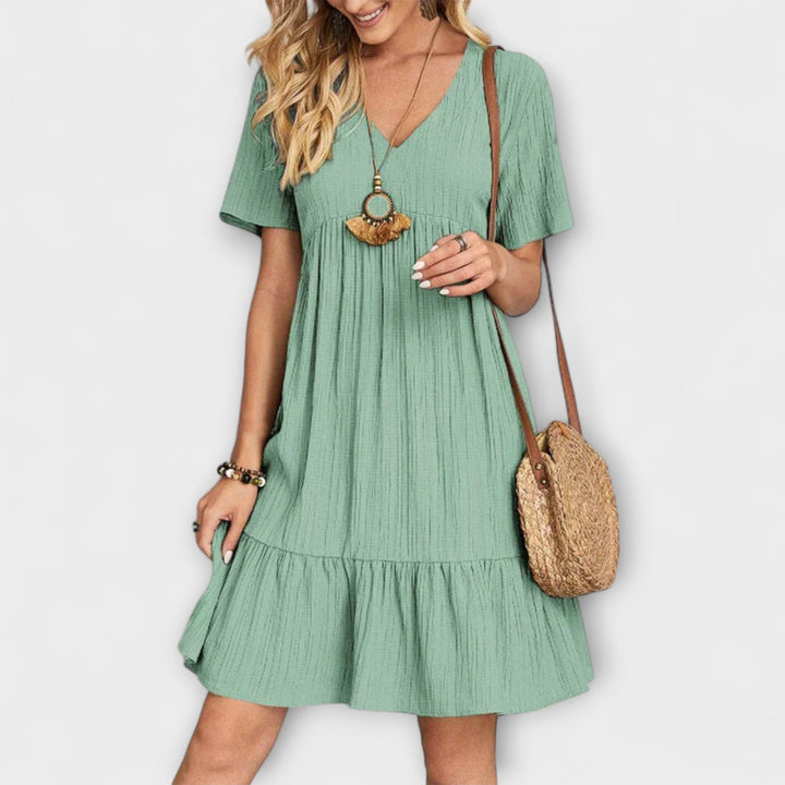 Audrey - Chic Bohemian Ruffle Hem Mini Dress